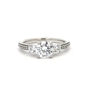 1 1/2 ctw three-stone round french-set diamond engagement ring