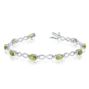 10K White Gold Oval Peridot Stones And Diamonds Infinity Tennis Bracelet, 7"