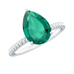 Created Emerald Solitaire Teardrop Ring with Hidden Moissanite