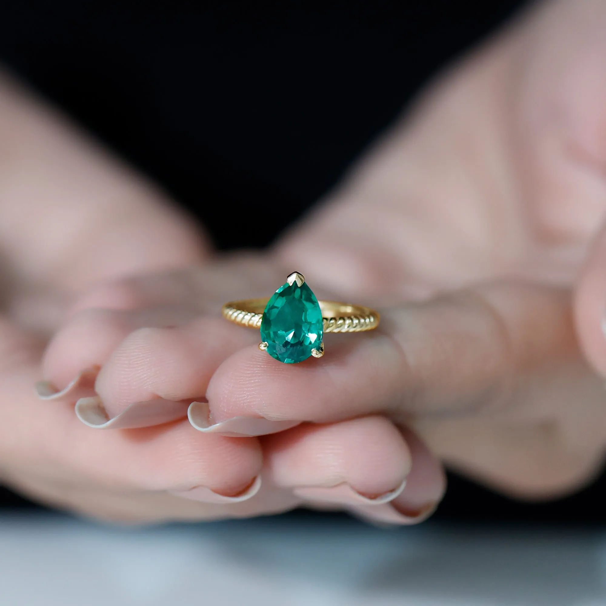 Created Emerald Solitaire Teardrop Ring with Hidden Moissanite