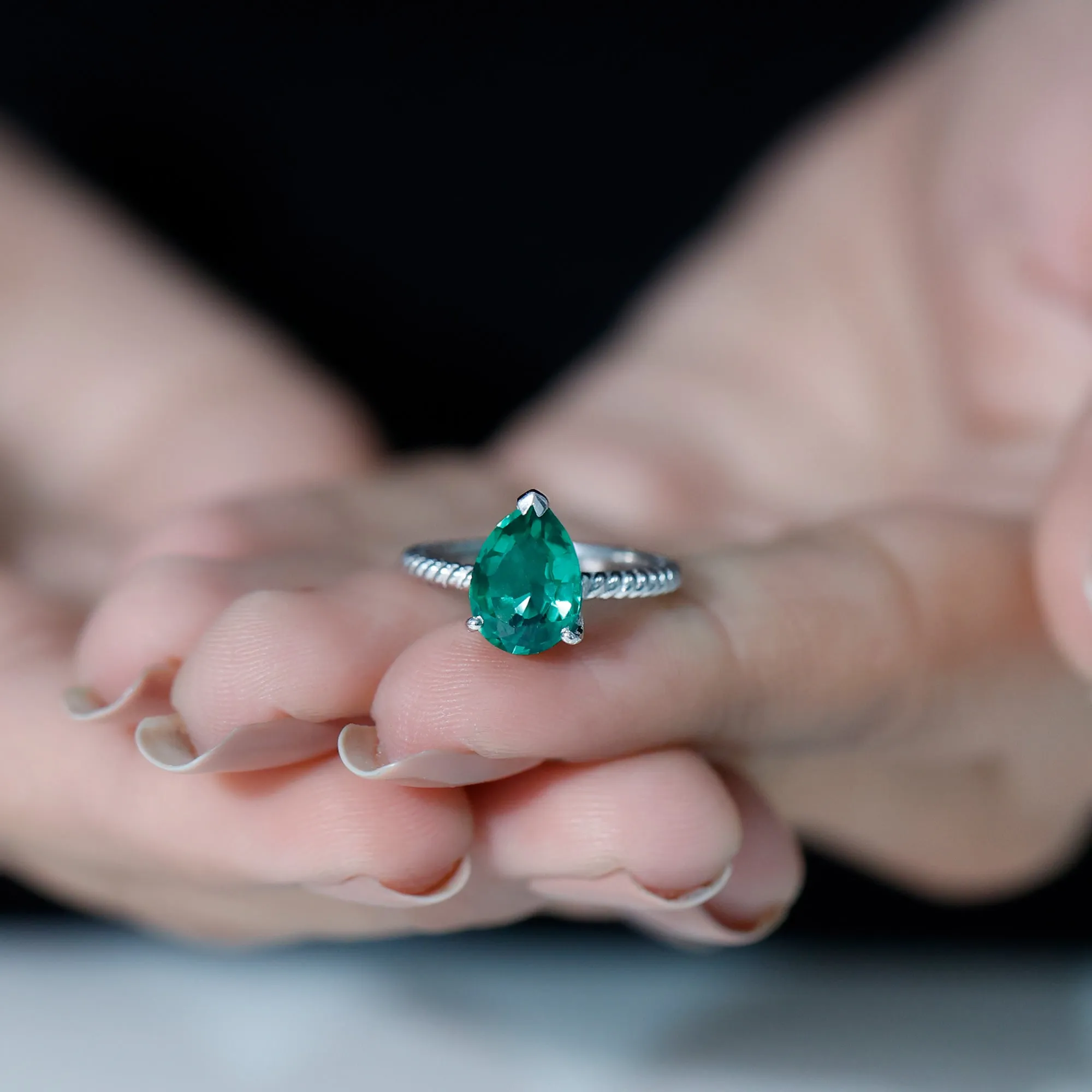 Created Emerald Solitaire Teardrop Ring with Hidden Moissanite