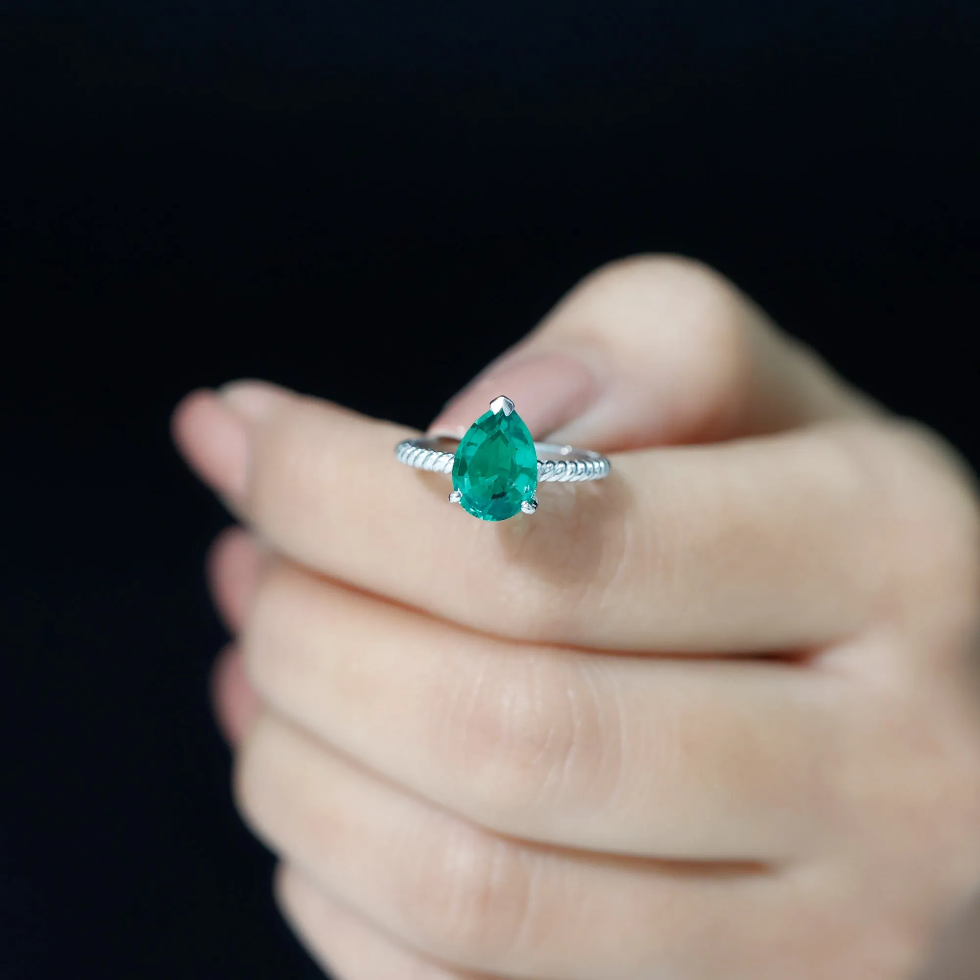 Created Emerald Solitaire Teardrop Ring with Hidden Moissanite