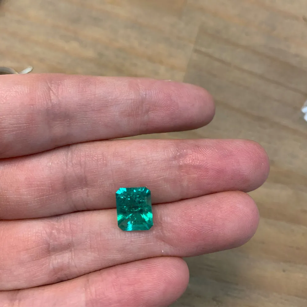 Emerald Solitaire Ring