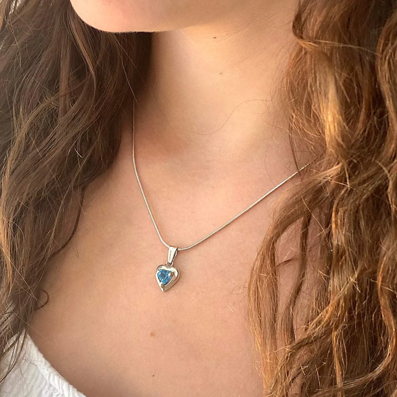 Heart shape silver pendant Blue Topaz