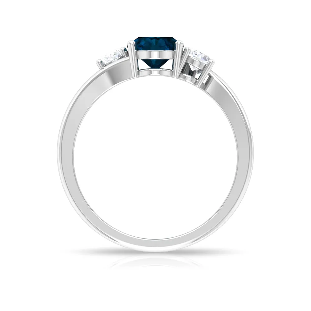 London Blue Topaz Solitaire Bypass Ring with Diamond Side Stones