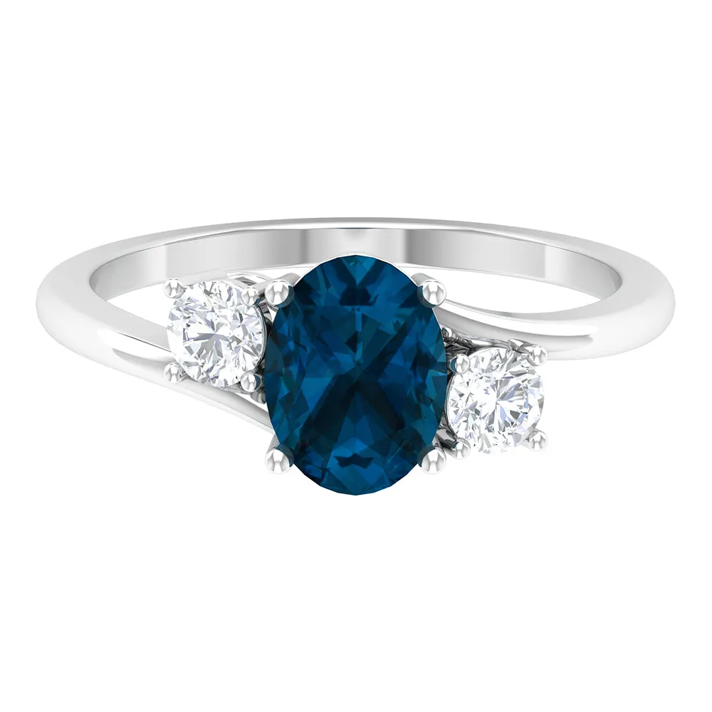 London Blue Topaz Solitaire Bypass Ring with Diamond Side Stones