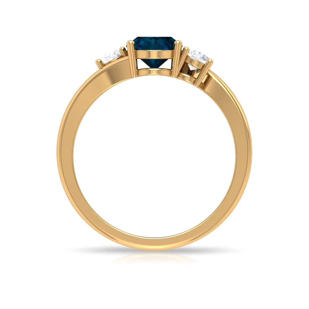 London Blue Topaz Solitaire Bypass Ring with Diamond Side Stones
