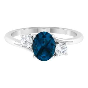 London Blue Topaz Solitaire Bypass Ring with Diamond Side Stones