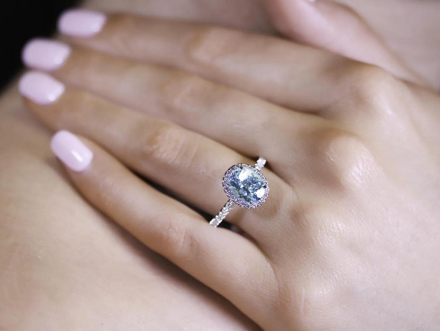 Paraiba Tourmaline and Diamond Halo Ring in Platinum