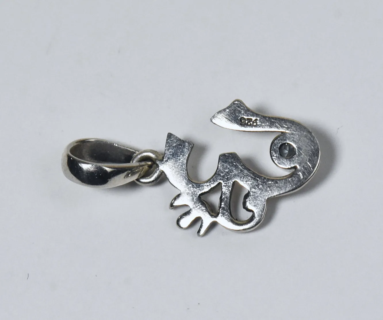 Sterling Silver Blue Topaz Om Symbol Pendant