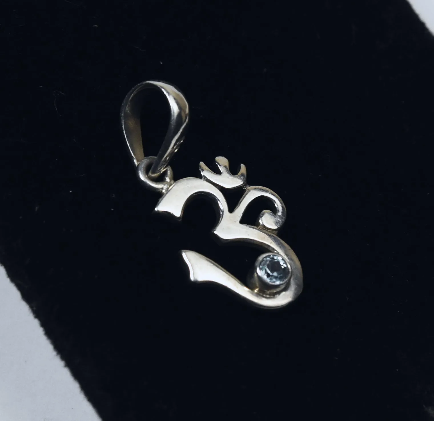 Sterling Silver Blue Topaz Om Symbol Pendant