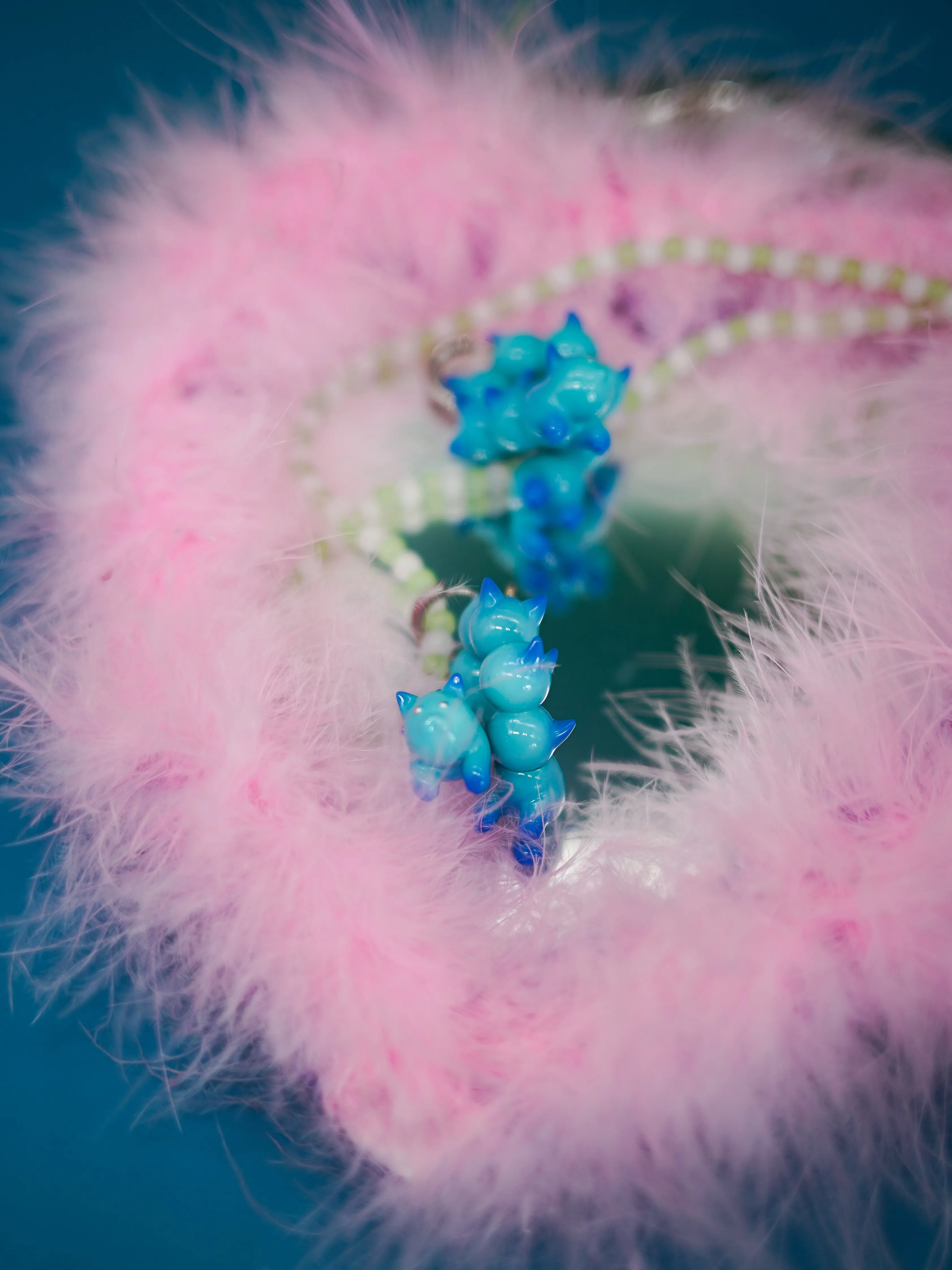 Turquoise and blue catcaterpillar with lots of ears necklace & earring
