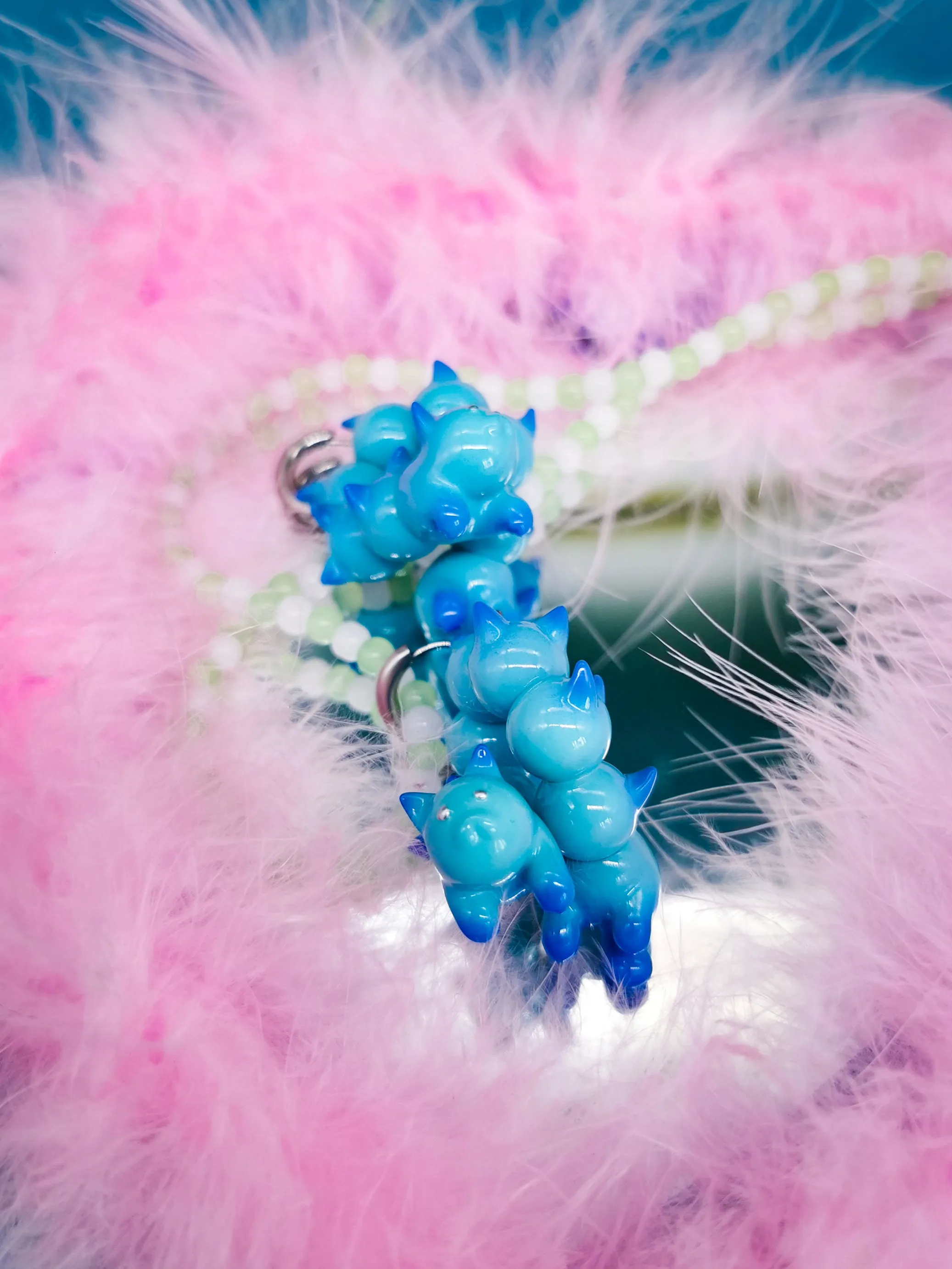 Turquoise and blue catcaterpillar with lots of ears necklace & earring