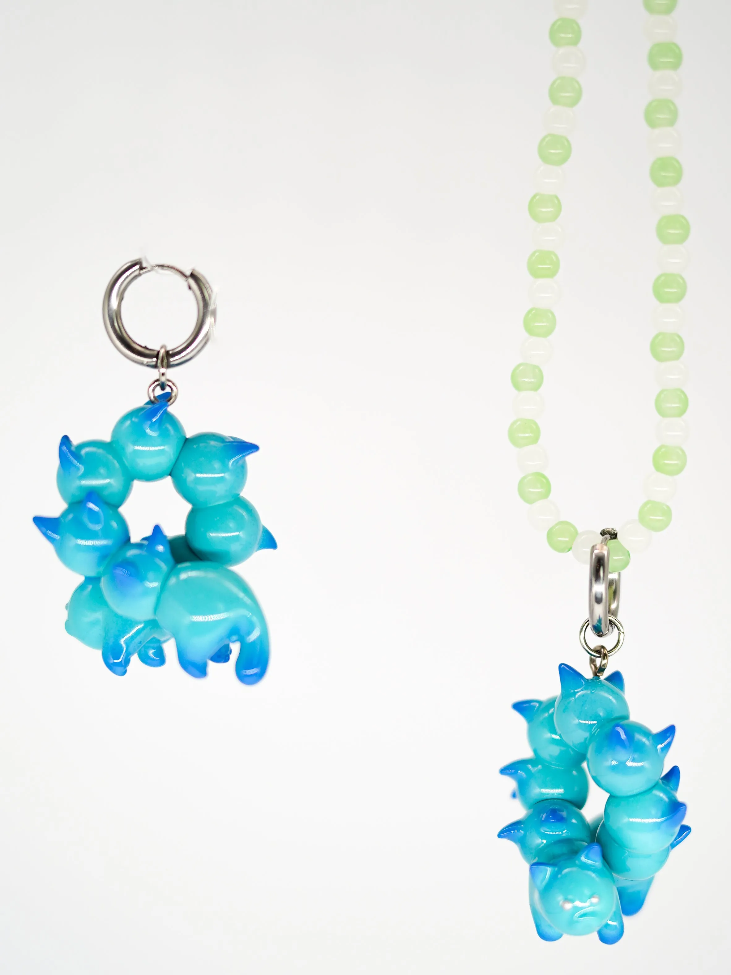Turquoise and blue catcaterpillar with lots of ears necklace & earring