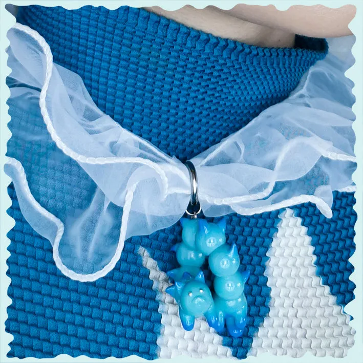 Turquoise and blue catcaterpillar with lots of ears necklace & earring