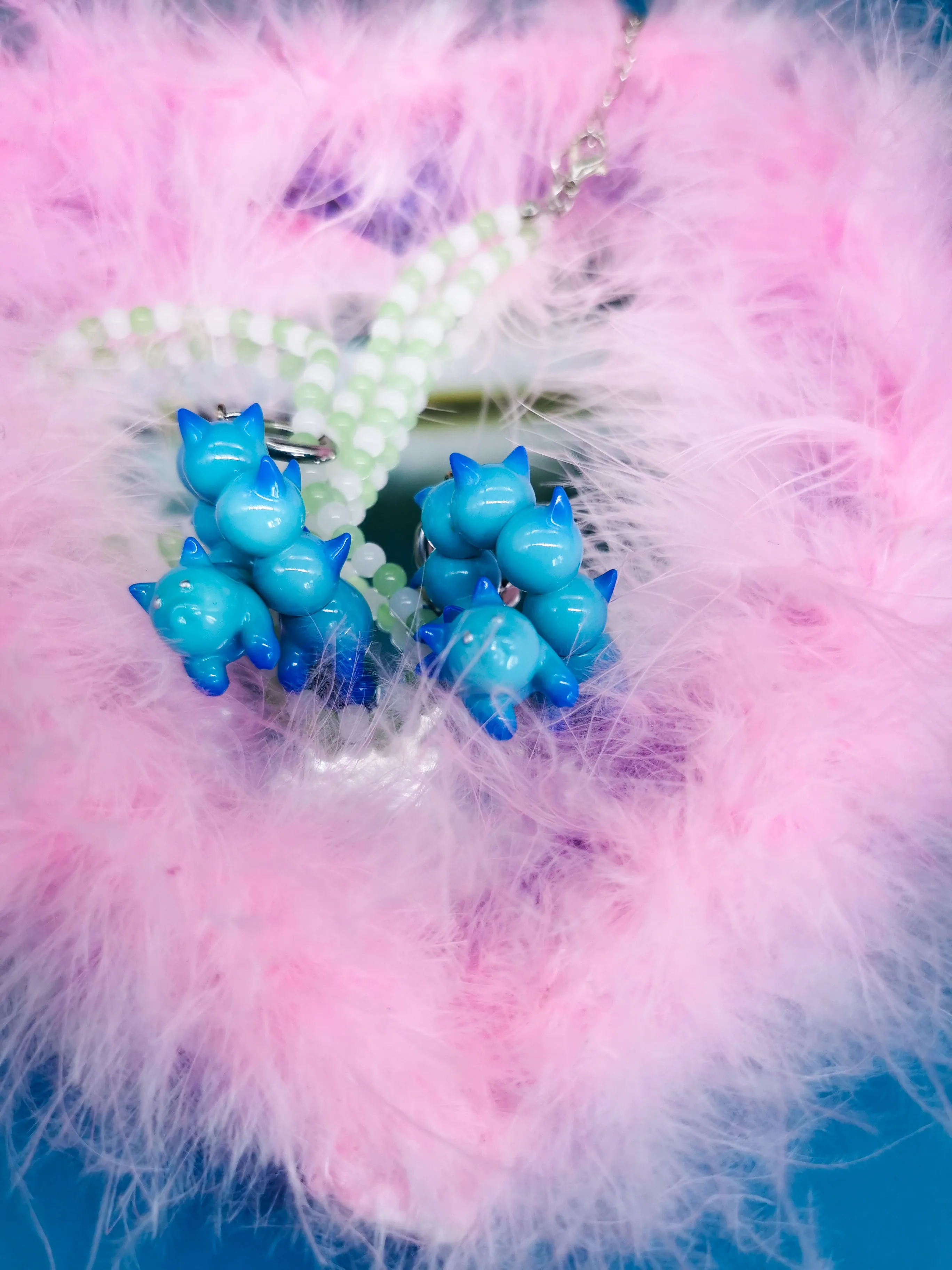 Turquoise and blue catcaterpillar with lots of ears necklace & earring
